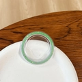 Close-up of circular phone grip ring with sparkling green glitter and pearl finish - Magnetic Base - Ice Crushed - Dark Green