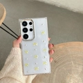 Detail of glittery blue Samsung Galaxy case with 3D yellow bow and pearl charms - Yellow / Samsung A16