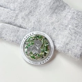 Macro detail of a magnetic glitter bear phone socket with green flowing sand effect - Colorful Bear Mirror No. 11 (Magnetic Gift - No. 11)
