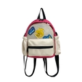Kinderrucksack in Rosa und Off-White mit Kontrastfarben und Cartoon-Stickereien - Beige