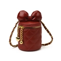 Mini deep red diamond quilted cylinder chain bag with oversized bow and gold accents - Red