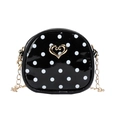 Mini black polka dot crossbody bag for girls with heart hardware and gold chain strap - Black