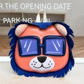 Close-up of cute 3D lion kids backpack with orange shell and blue felt mane detail - Blue Lion