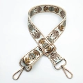 Detail of adjustable bohemian floral guitar strap with golden metal lobster clasps - No. 326 Blue Small Circles