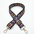 Detail of floral woven colorful bag strap with light gold metal lobster clasps - Floral