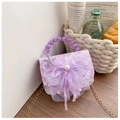 Close-up of purple lace girls purse with pearls, bow, and sparkling starfish charms - Purple