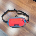 Kids quick-dry outdoor waist bag in red and blue contrast with adjustable strap - Red