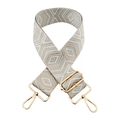 Close-up of beige and gold jacquard strap with geometric patterns and metal hooks - Silver Clasp / Silver Thread Diamond
