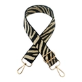 Close-up of zebra pattern wide strap with gold-tone swivel hooks and adjustable buckle - Black Gold Thread Zebra