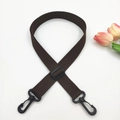 Detail of a dark brown adjustable canvas strap with durable black plastic swivel hooks - 10 Coffee