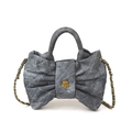 Quilted denim bow-shaped crossbody bag for children featuring gold floral buckle and chain strap - Denim Blue