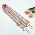 Detail of light pink 3.8cm bag strap with sequins, embroidery and golden metal hooks - Pink