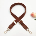 Detail view of brown fabric shoulder strap with gold metal buckle and leather ends - Gold Buckle / 4-Brown