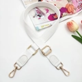 Adjustable white cotton canvas bag strap with golden metal buckles and faux leather ends - White