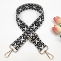 Close-up of 3.8cm ethnic geometric embroidered strap with gold metal swivel hooks - 13-Beige Black Grey
