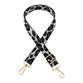 Detailed close-up of adjustable leopard print jacquard strap with gold metal hardware - Gold Buckle / Grey Black Leopard
