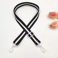 Adjustable black and white striped shoulder strap with white plastic buckles and hooks - Black