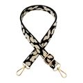 Detailed view of leopard jacquard bag strap with gold metal buckles and high-density texture - Leopard Beige