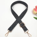 Detail of woven geometric replacement strap with gold metal hooks and slider - Gold Buckle / Dark Grey Small V Pattern