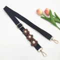 Adjustable black woven shoulder strap with brown crochet flowers and gold hardware hooks - Black Strap + Coffee Flower