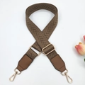 Detail of 3.8cm adjustable caramel strap with herringbone pattern and gold hardware - Dark Khaki