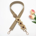 Detail of bohemian khaki woven bag strap with handmade crochet sunflowers and gold hooks - Khaki