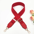 Detail of red herringbone pattern fabric guitar strap with gold lobster clasps and PU leather - Red