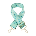 Close-up of jacquard woven bag strap with bird pattern and golden lobster clasps - Gold Buckle / Light Blue