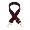 Detail of adjustable thick wine red woven bag strap with polished gold metal hardware - Deep purple