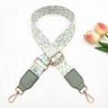 Detail of adjustable mint green leopard print bag strap with golden metal hooks and leather - Light Green Leopard + Matcha Green Leather