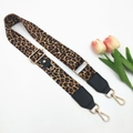 Detail of adjustable leopard print wide strap with gold metal buckles and hardware - Brown Multi-Leopard Single Strap