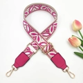 Detail of bohemian jacquard embroidered bag strap with pink leather ends and gold hooks - Rice Rose Red + Rose Red Leather