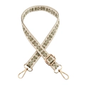 Close-up of geometric woven bag strap with golden buckles and adjustable metal slider - Beige Army Green