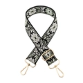Close-up of ethnic floral embroidery pattern on bag strap with gold metal lobster clasp - 23-Black Base Pea Green