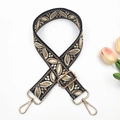 Détail de la bandoulière en jacquard brodé avec motif de feuilles et boucles dorées - Style 27-Noir & Kaki