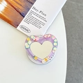 Detail of heart-shaped phone grip featuring mirror surface and colorful fruit patterns - Pearl Purple