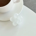 Detailopname van een witte bloem telefoonhouder met glitterhars op een witte tafel - Wit (Glitter)