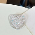 Close-up of heart-shaped phone grip with silver glitter and rhinestone crystal border - (White Zirconia) Magnetic - Starry Sequins - Heart / Iridescent White