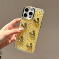 Hand holding iPhone glitter phone case with 3D gold heart accents and metallic frame - Gold Hammered Heart Clip / iPhone 17 Pro Max