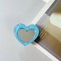Close-up of sky blue heart-shaped foldable phone socket with built-in makeup mirror - Light Blue