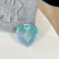 Detail of laser-cut heart magnetic phone grip with iridescent holographic finish - Magnetic / Fantasy Blue