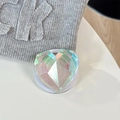 Detailed macro view of heart-shaped holographic laser phone grip with diamond cut texture - Magnetic / Iridescent Transparent
