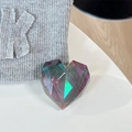 Macro shot of 3D geometric laser heart phone grip with colorful holographic gradient - Adhesive Grip / Iridescent Black