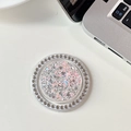 Macro shot of round crystal phone grip with pink sequins and star glitter detail - Magnetic - White Rhinestone - Starry Sequins - Round - Pink