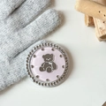 Macro shot of pink phone socket with cartoon bear design and sparkling rhinestone rim - Pink (Jelly Bear Mirror / White Zirconia)