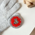 Close-up of red enamel bear phone socket with sparkling rhinestones on grey knit - Red (Jelly Bear Mirror / White Zirconia)