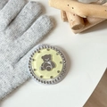 Macro shot of bear phone grip with rhinestones on soft knitted background - Yellow (Jelly Bear Mirror / White Zirconia)