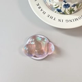 Macro detail of 3D cloud phone grip with iridescent gradient effect and glossy resin finish - Magnetic Cloud / Pink