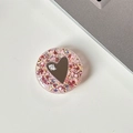 Detail view of a round phone grip featuring a silver heart mirror and shiny sequins - Transparent Stand - Colorful Sequins Heart Mirror - No. 6