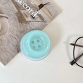 Macro shot of mint green candy button phone grip accessory on a minimalist desk setup - Magnetic Large Button / Crystal Solid Color-Forest Green